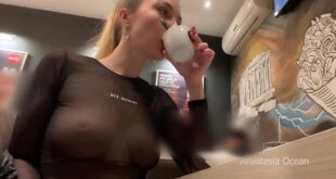 Flashing her big boobs in transparent top in public cafe